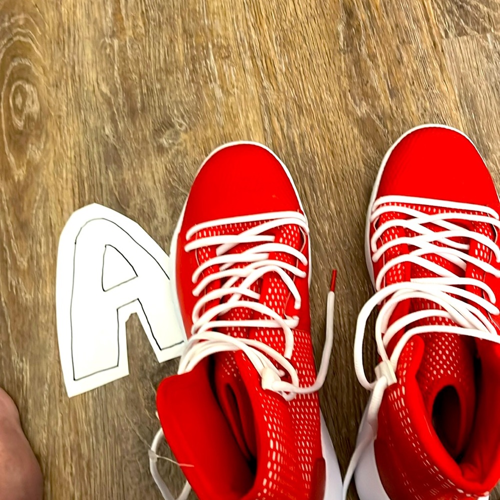 Under armour size 12.5, red and white, worn once
